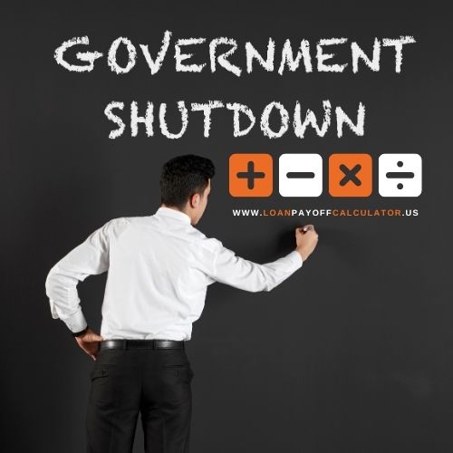 Navy Federal Credit Union member checking shutdown relief options and zero-interest loan program on a laptop during a government shutdown.